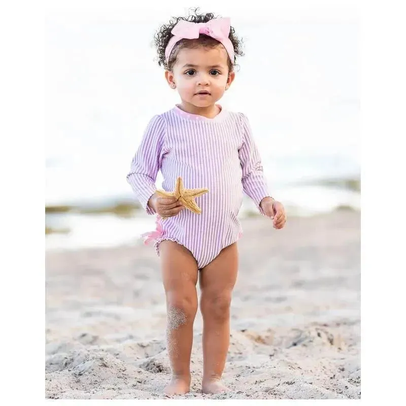 RuffleButts - Baby Girl Seersucker One Piece Rash Guard, Lilac - Image 2